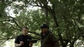 Richard Schofield, general manager for Whāngārā Farms, and Matt Harcombe, sustainability manager for Silver Fern Farms, discussing Net Carbon Zero mapping of the farm.