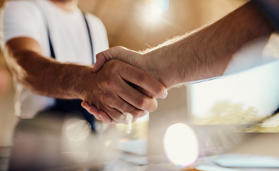 two men shaking hands