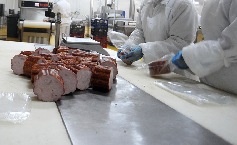 Portions of ham on the packing line