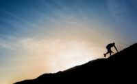 Man Climbing Mountain