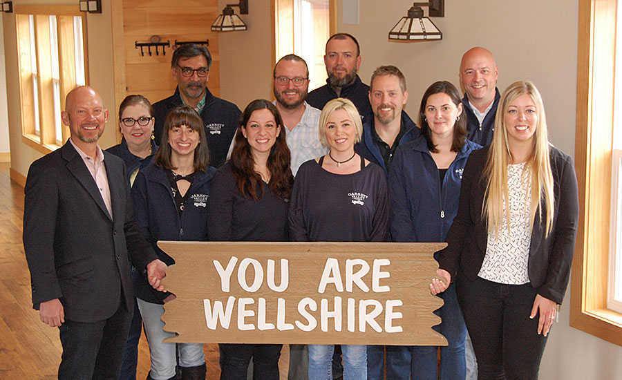 David Van Eekeren with the Wellshire Farms Team