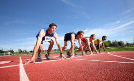 Track Runners at Starting Line